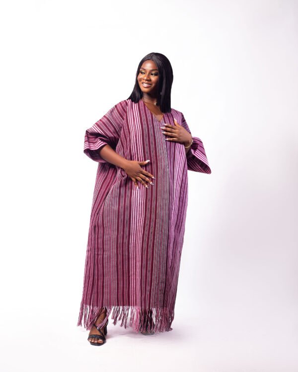 A bold and elegant piece handmade boubou from authentic handwoven kente fabric, straight from Northern Ghana. Designed for statement moments and cultural pride.